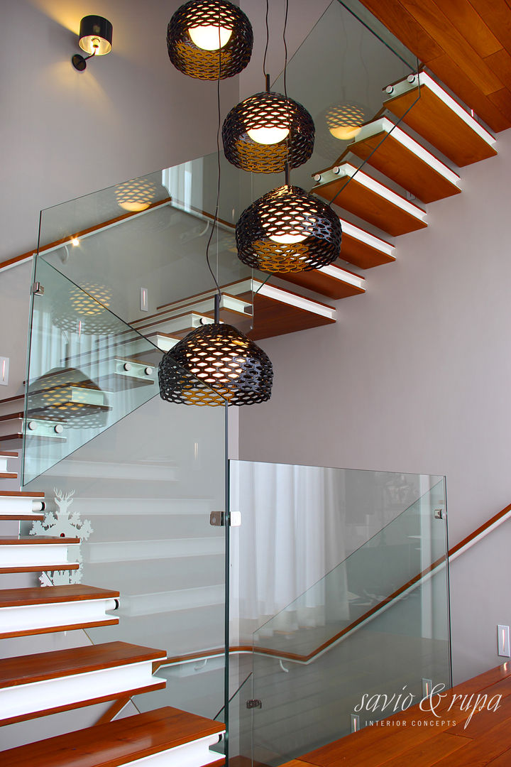 Cantilevered Staircase Savio and Rupa Interior Concepts Scandinavian style corridor, hallway& stairs Lighting