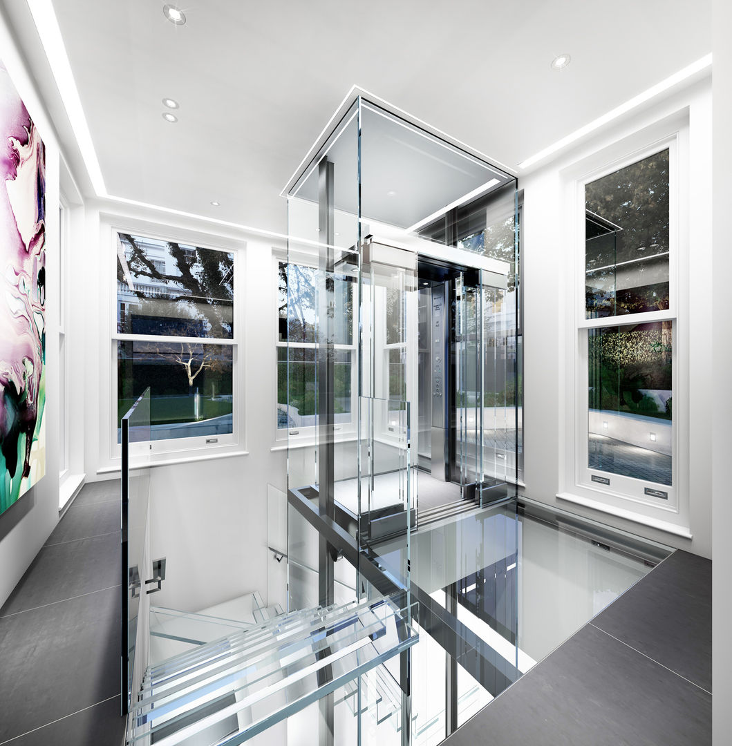 ​House in Notting Hill by Recent Spaces Recent Spaces Modern corridor, hallway & stairs Glass glass floor,glass,glass lift,lift,elevator,treads,slate,grey,transparent,glazing,light