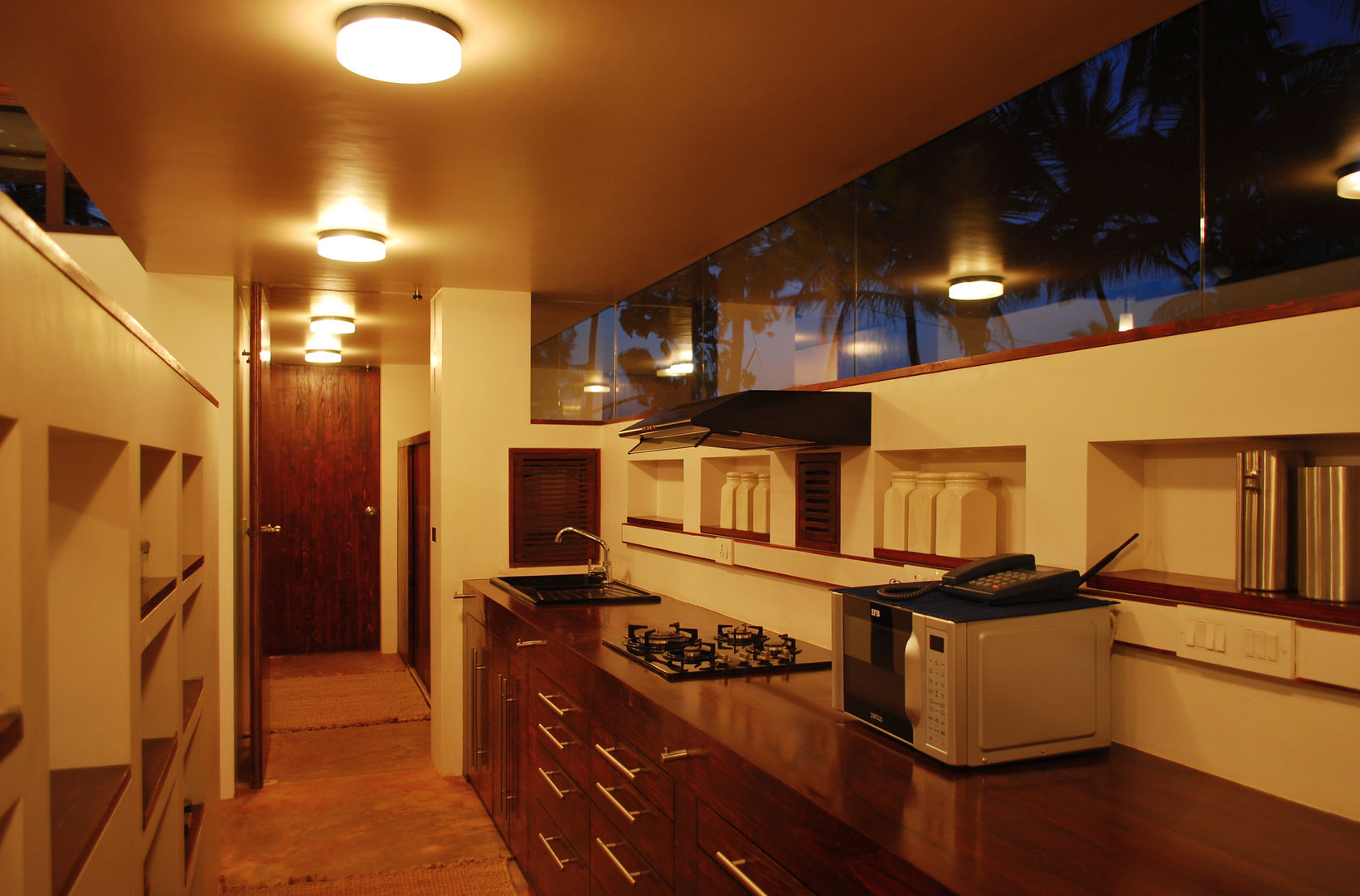 Kitchen looking towards guest bathroom GDKdesigns Kitchen