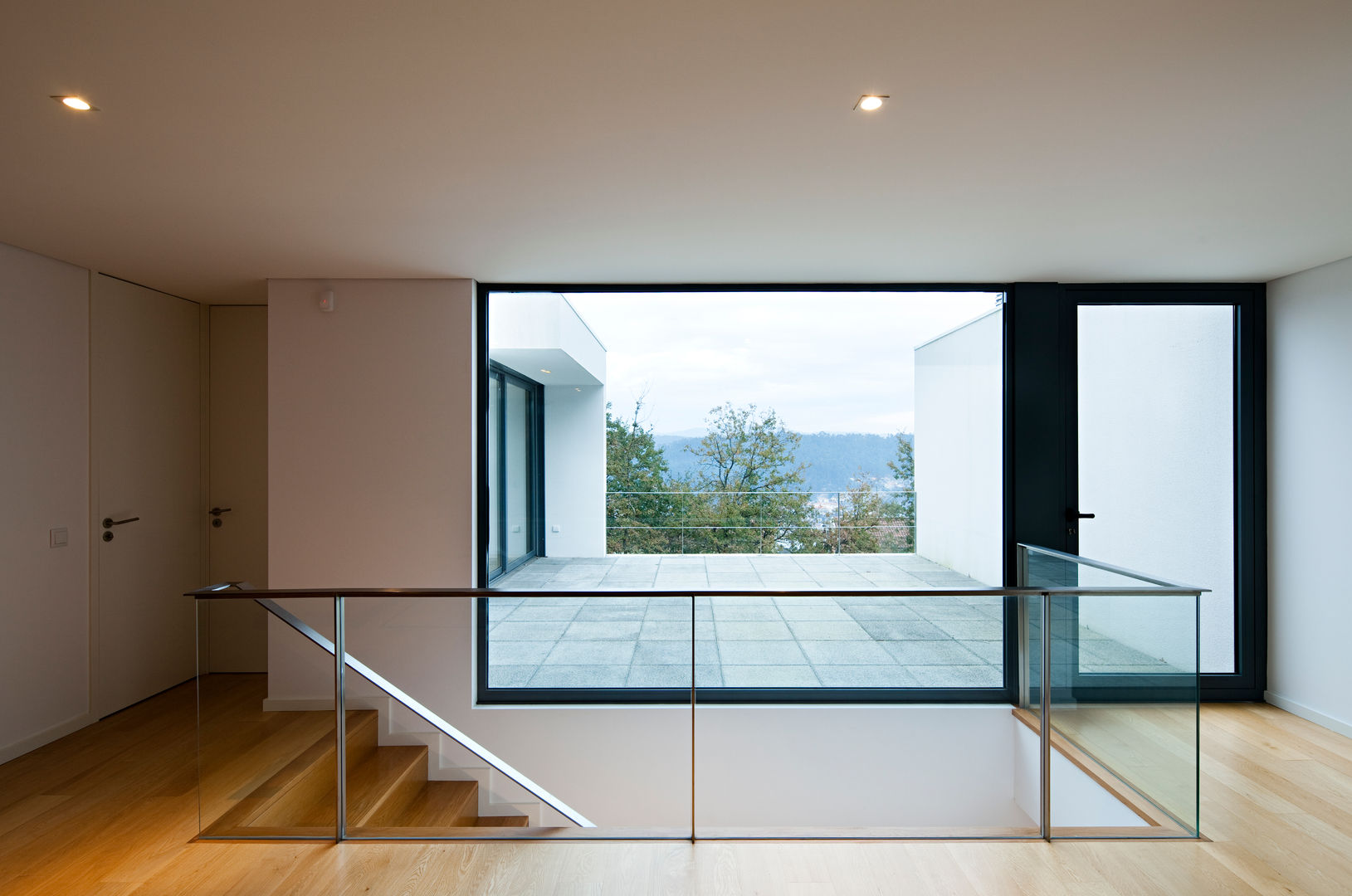 House in Barcelos, Portugal, Rui Grazina Architecture + Design Rui Grazina Architecture + Design minimalist style balcony, porch & terrace