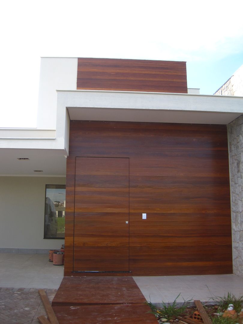 Front (Fachada frontal) homify منازل حجر