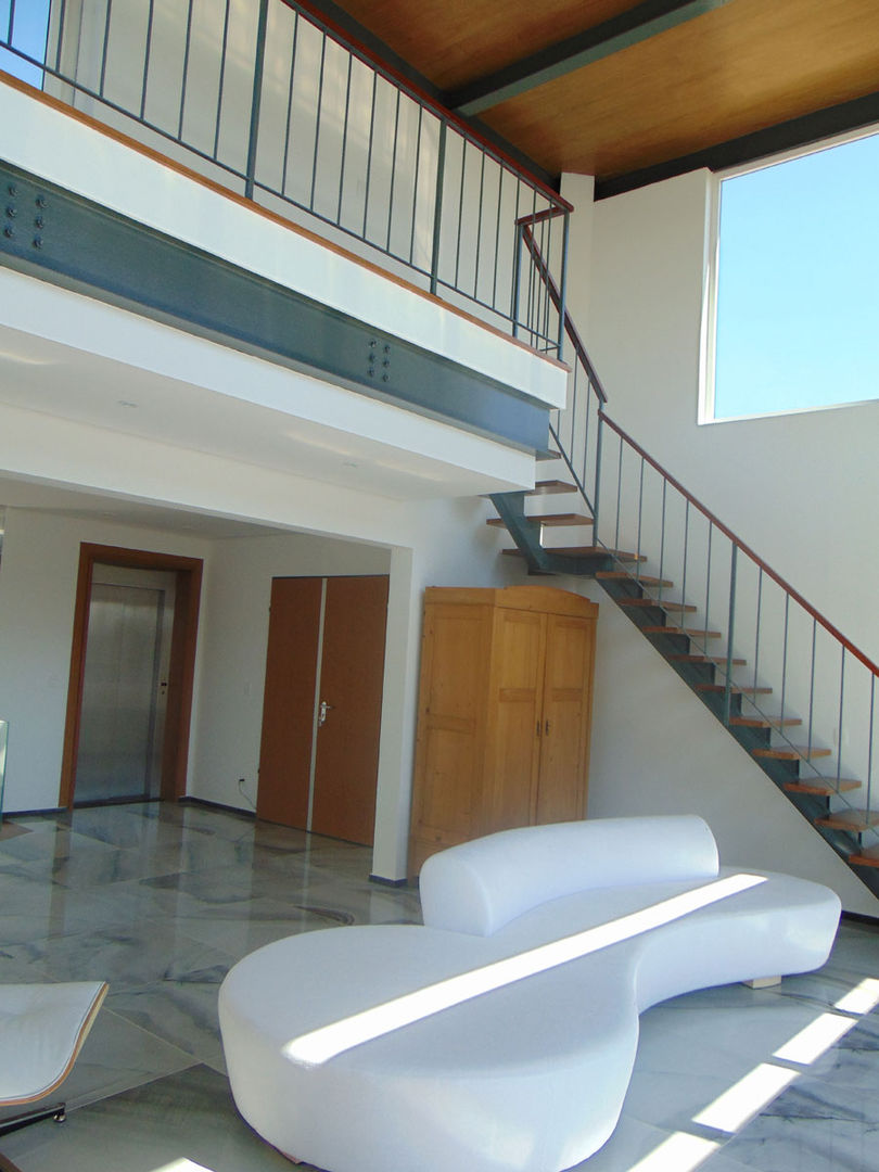 homify Modern Corridor, Hallway and Staircase