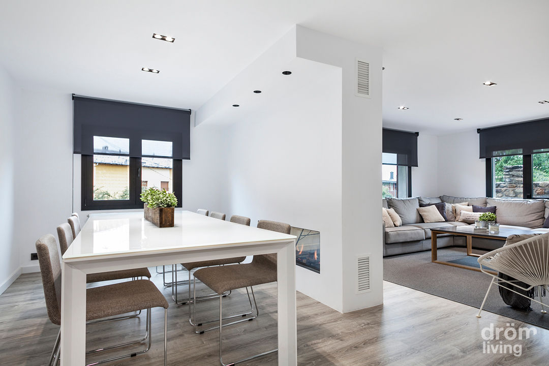 CASA EN LLÍVIA: MINIMALISMO Y CALIDEZ, Dröm Living Dröm Living Minimalist dining room