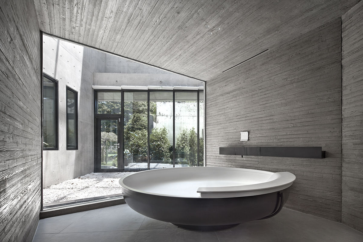 homify Modern bathroom Concrete