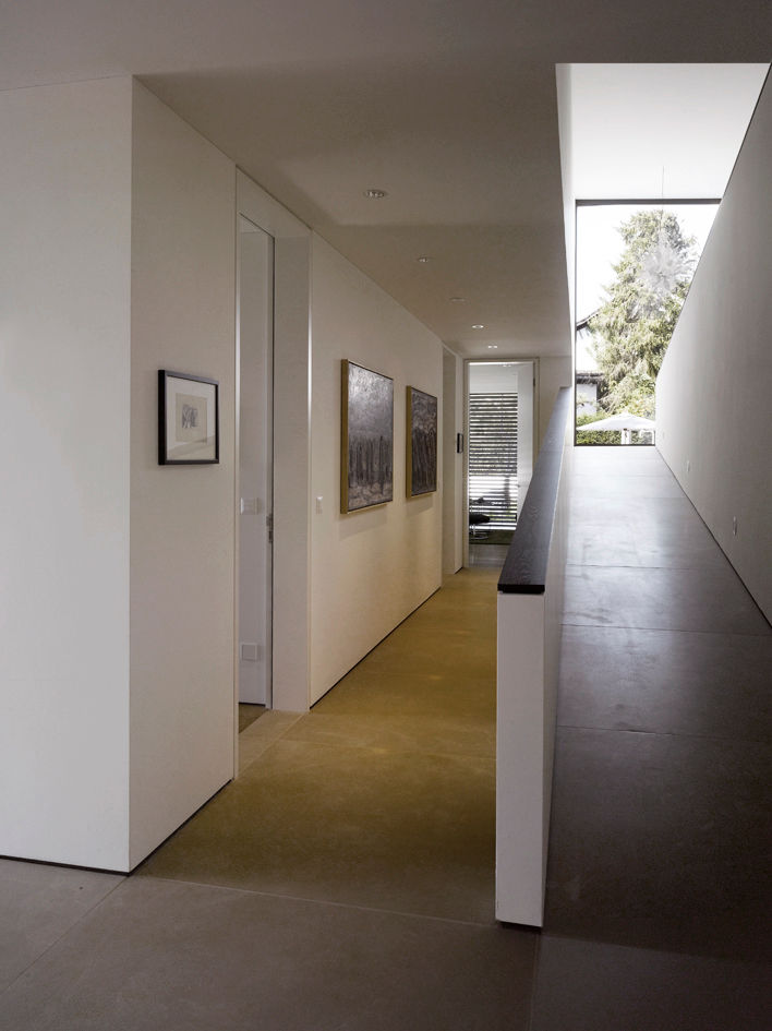 Objekt 188, meier architekten zürich meier architekten zürich Modern corridor, hallway & stairs Concrete