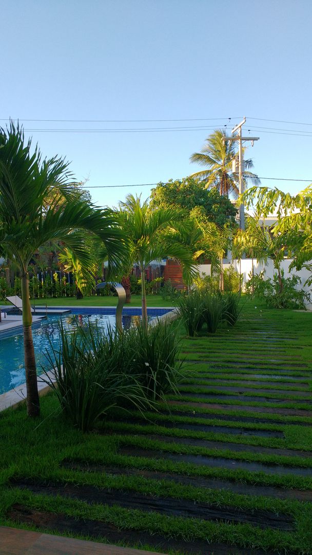 CASA DE PRAIA - GUARAJUBA, Tânia Póvoa Arquitetura e Decoração Tânia Póvoa Arquitetura e Decoração 트로피컬 정원 우드 우드 그레인