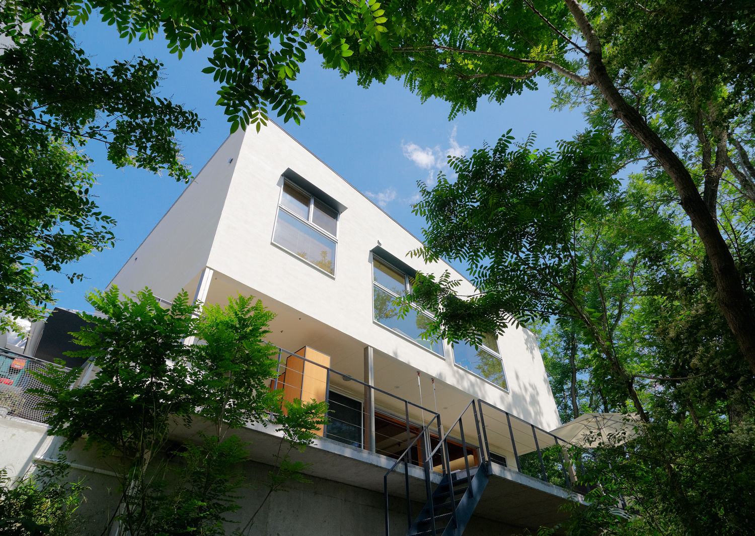 T-house, coil松村一輝建設計事務所 coil松村一輝建設計事務所 Casas de estilo ecléctico