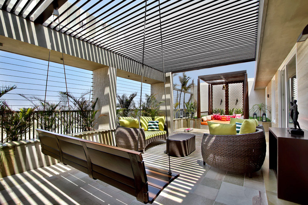 Nikhil patel residence, Dipen Gada & Associates Dipen Gada & Associates Modern balcony, veranda & terrace Furniture,Property,Table,Plant,Couch,Chair,Shade,Sky,Outdoor furniture,Flooring