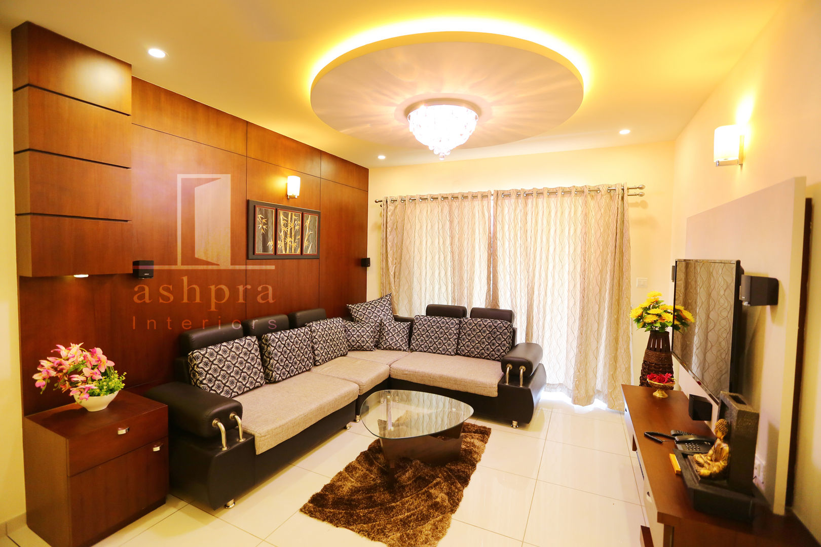 Interior work for a 2 bedroom apartment @ Mangalore.., Ashpra interiors Ashpra interiors Salas de estar asiáticas Sofás e divãs