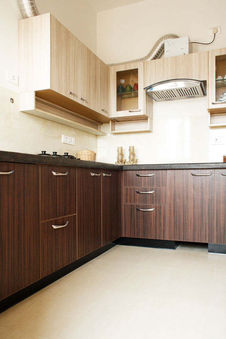 Interior work for a 3 bedroom apartment @ Anna Nagar, Ashpra interiors Ashpra interiors Cocinas de estilo asiático Contrachapado Estanterías y gavetas