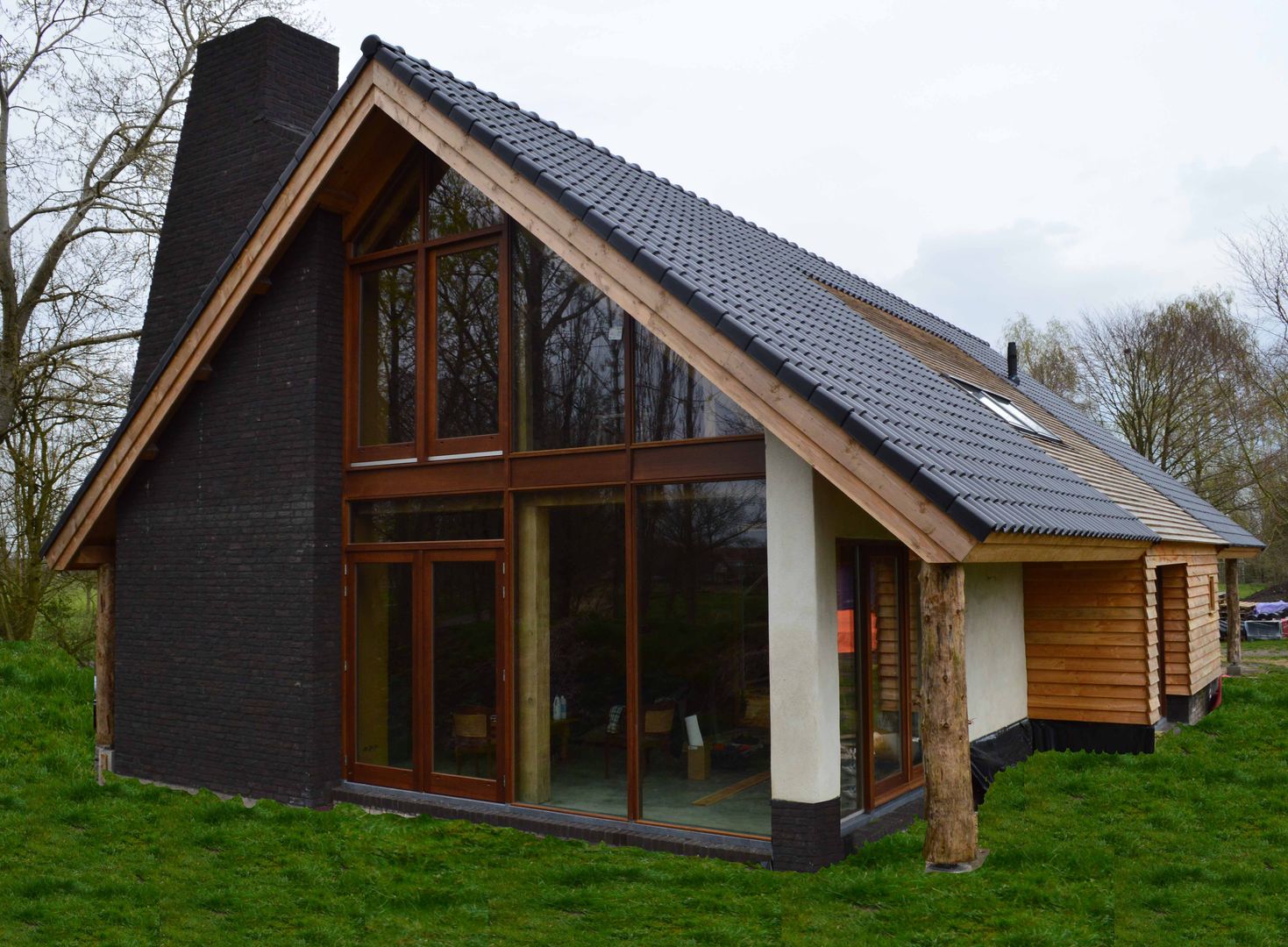 Ecologische woning Chaam, STROOM architecten STROOM architecten Casas de estilo rural Piedra