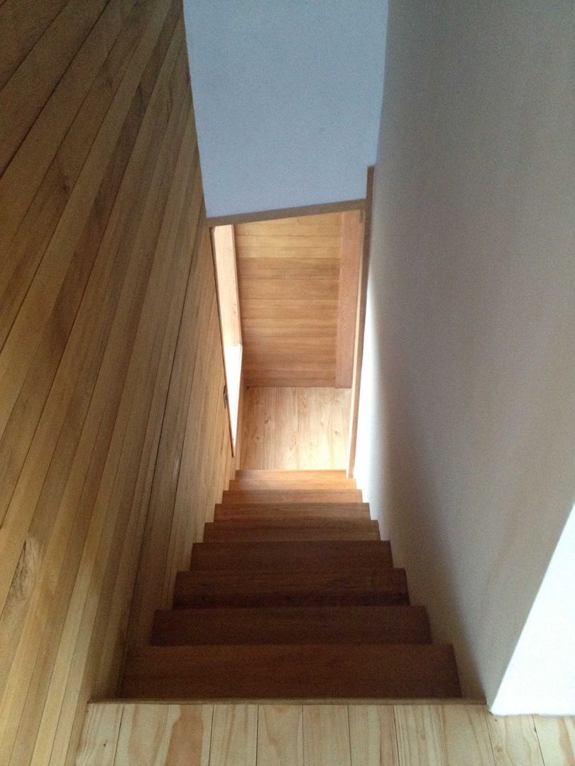homify Modern corridor, hallway & stairs Wood Wood effect