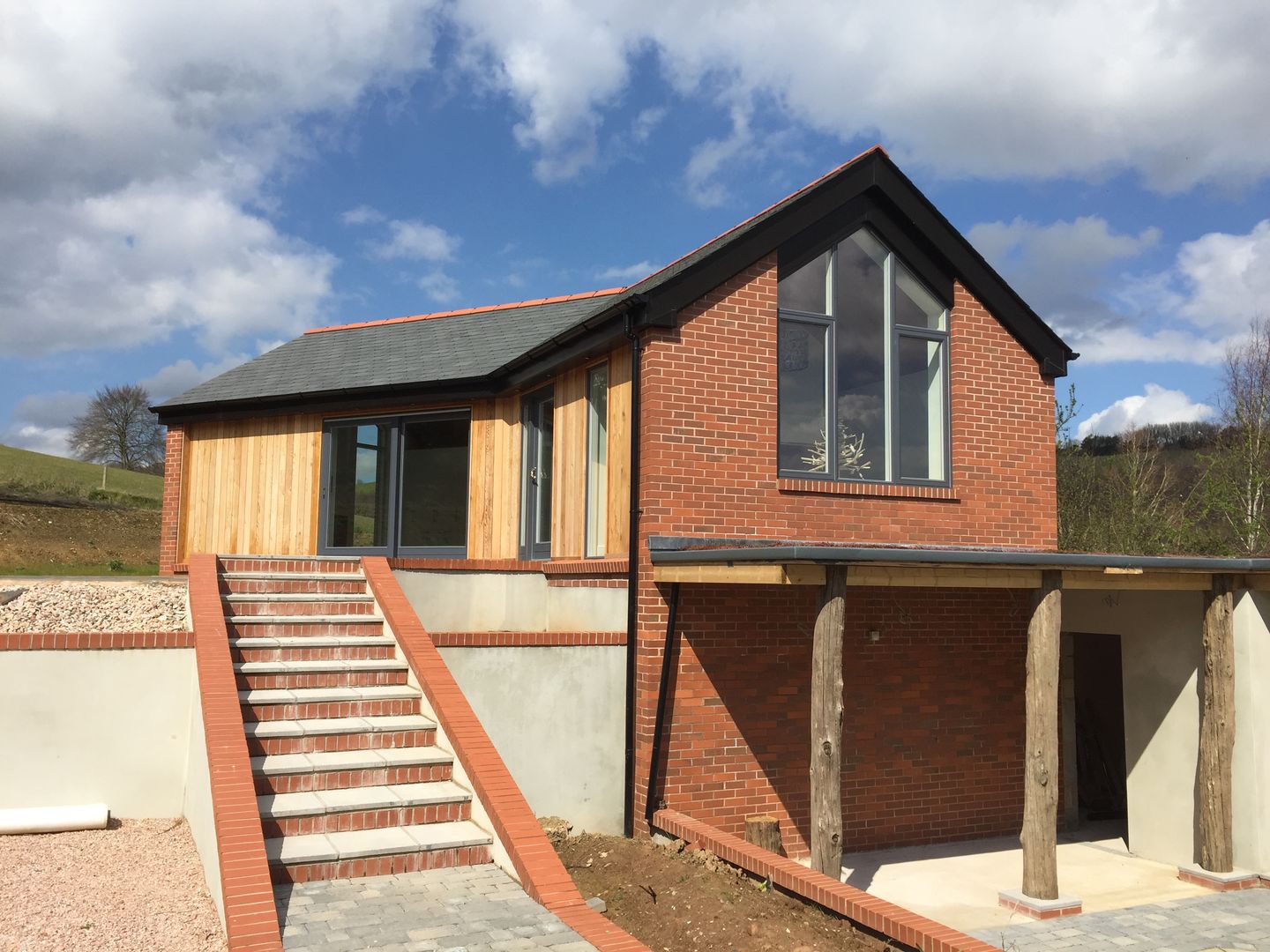 End view over car port Building With Frames Minimalist houses Wood Wood effect