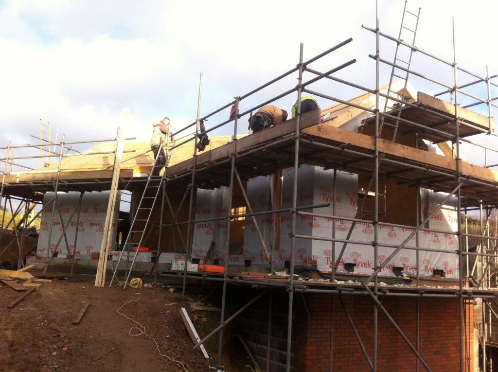 Side elevation in progress Building With Frames Minimalistyczne domy Drewno O efekcie drewna