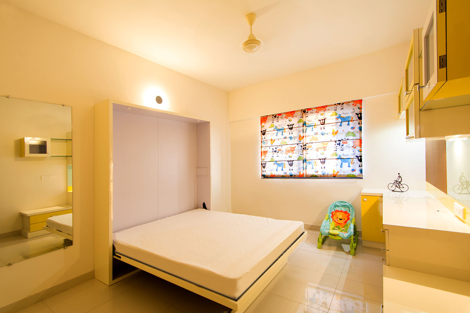 A residence for Mr.Nitin Warrier at Blue Ridge ,Hinjewadi ,Pune, Navmiti Designs Navmiti Designs غرفة الاطفال أسرة نوم