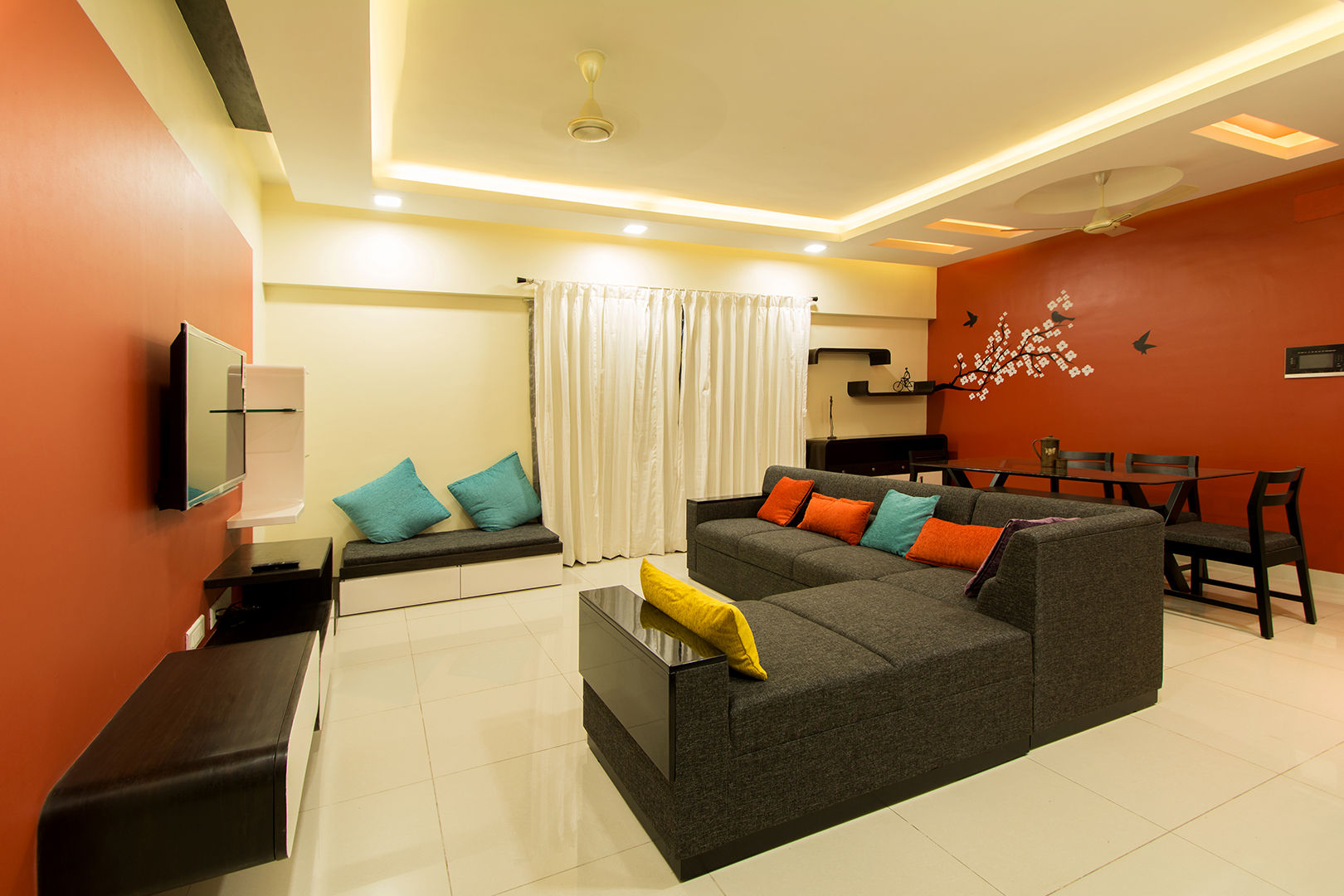 A residence for Mr.Nitin Warrier at Blue Ridge ,Hinjewadi ,Pune, Navmiti Designs Navmiti Designs Вітальня Дивани та крісла