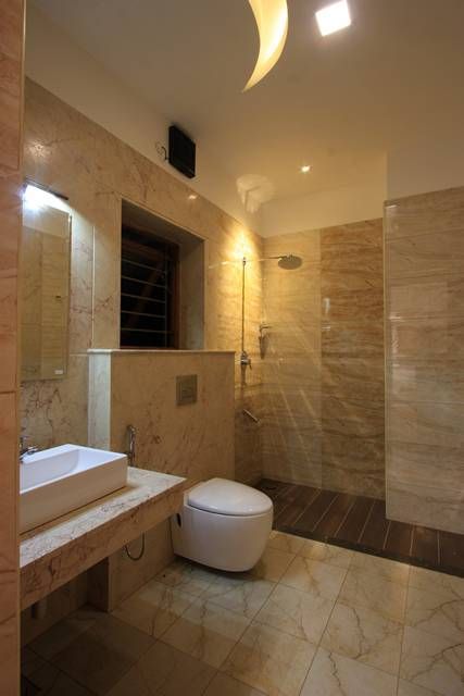 Toilet Ansari Architects Modern style bathrooms