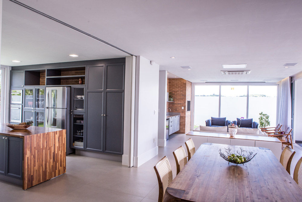 Residencia Domm Arquitetura, Domm Arquitetura Ltda Domm Arquitetura Ltda Modern dining room