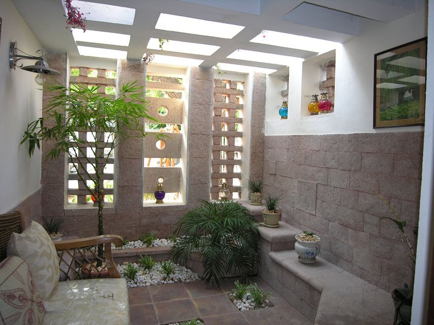 Stone Courtyard House, Ansari Architects Ansari Architects Giardino moderno