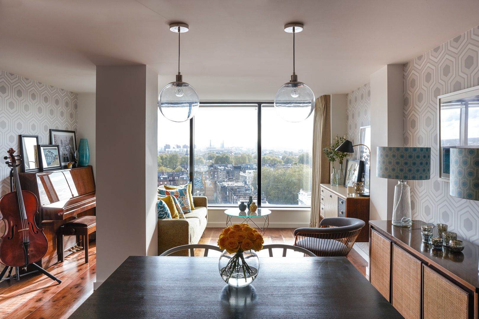 Gloucester Road Penthouse Bhavin Taylor Design Living room living room,wallpaper,patterned wallpaper,grey,sofa,armchair,cushions,sideboard,lamps,lighting,dining table,dining chair