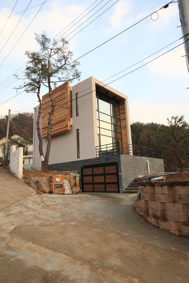 양평 M 하우스, SG international SG international Casas modernas Concreto