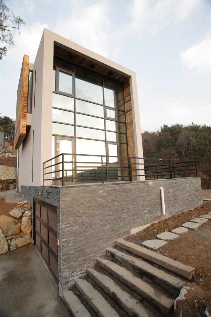 양평 M 하우스, SG international SG international Casas modernas Piedra