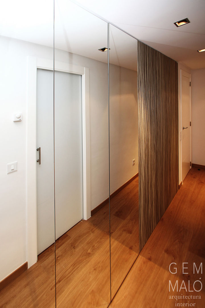 vestidor dormitorio matrimonio Gemmalo arquitectura interior Vestidores de estilo moderno Compuestos de madera y plástico