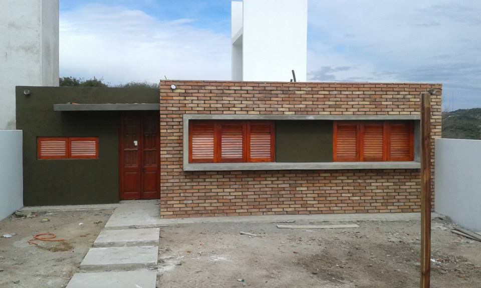 Vienda Salsipuedes, Cordoba, Q R Arquitectura Q R Arquitectura Country style houses Bricks