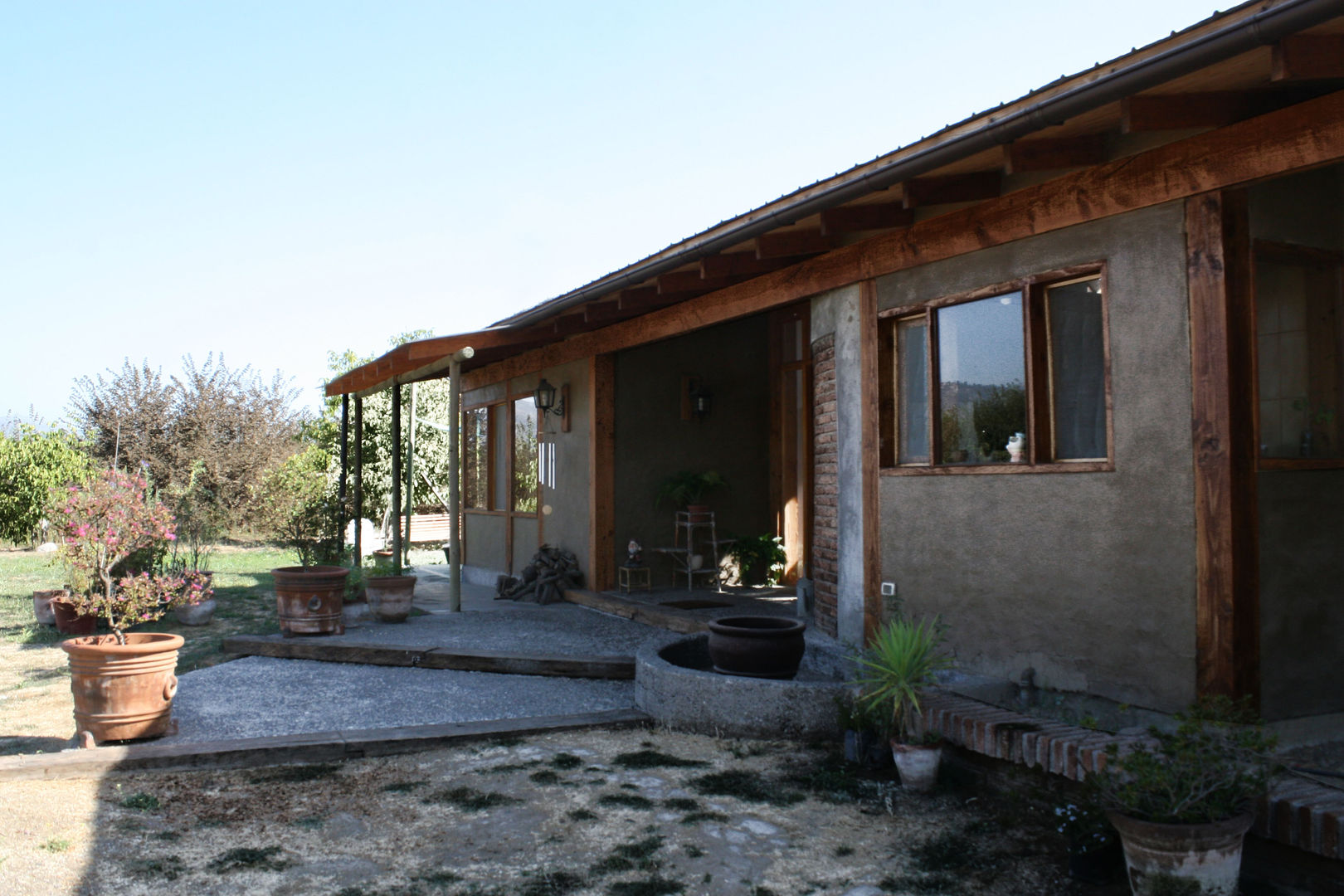 Diseño y Construcción de Casa Tau en Paine por ALIWEN, ALIWEN arquitectura & construcción sustentable - Santiago ALIWEN arquitectura & construcción sustentable - Santiago Casa unifamiliare