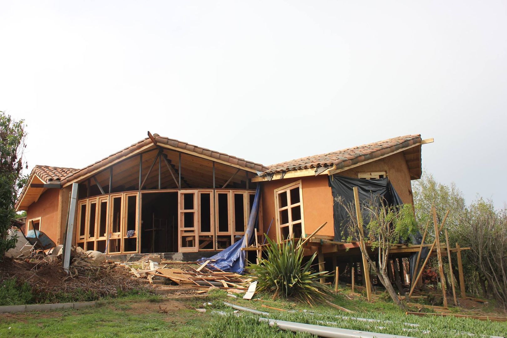 Ampliación y Remodelación de Casa Castillo Hepp en El Huape por ALIWEN, ALIWEN arquitectura & construcción sustentable - Santiago ALIWEN arquitectura & construcción sustentable - Santiago Single family home