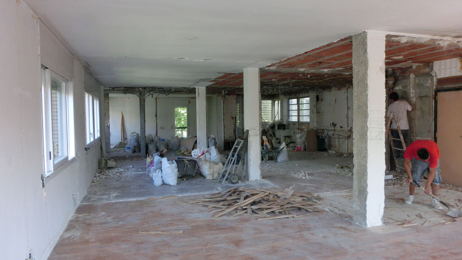 The original space, demolished.Seen from the future living room. Daifuku Designs Minimalist living room before,demolition