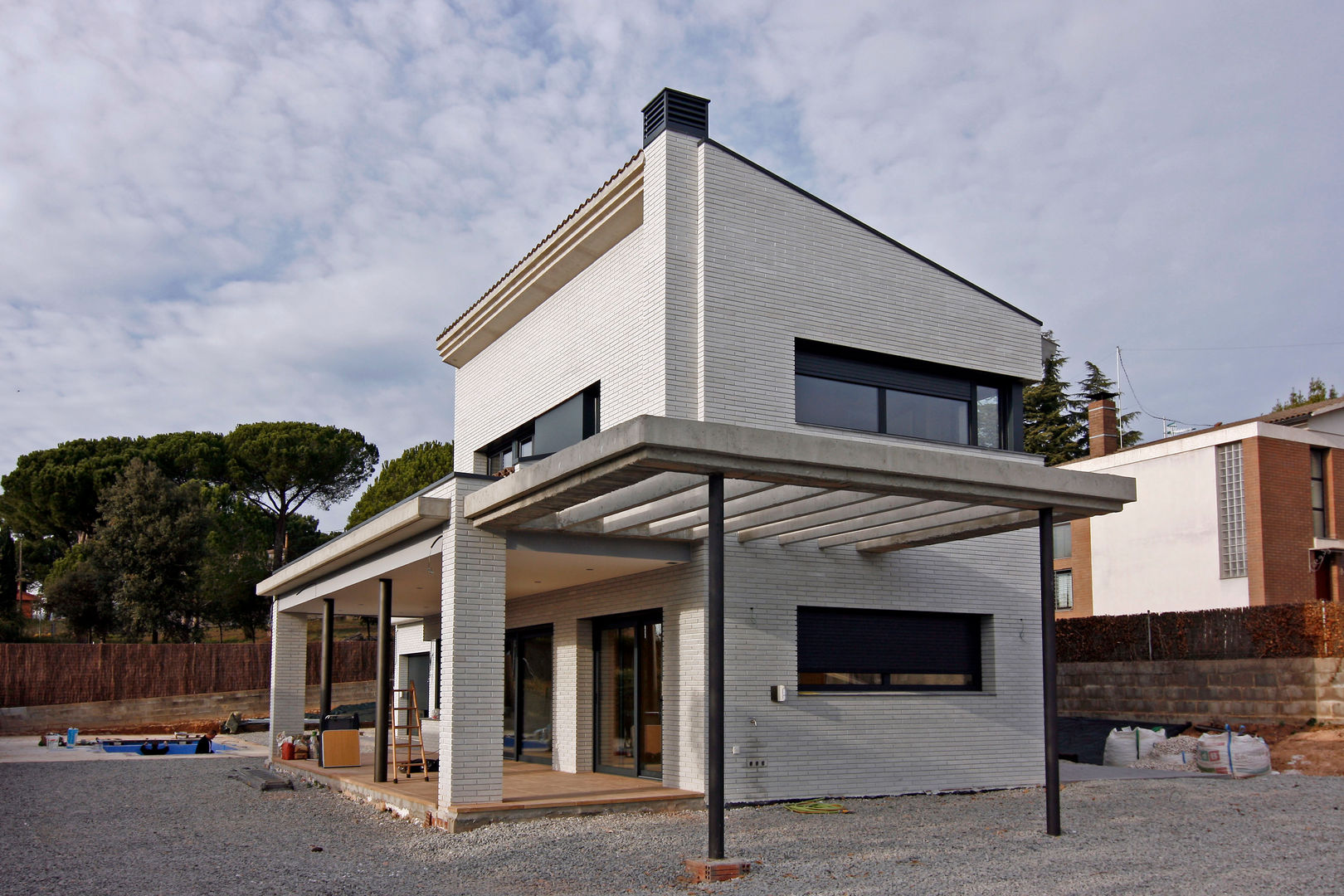 Vivienda en Sant Antoni de Vilamajor , Atres Arquitectes Atres Arquitectes 現代房屋設計點子、靈感 & 圖片 磚塊