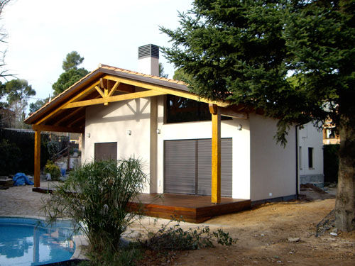 Ampliación Vivienda Valldoreix, Atres Arquitectes Atres Arquitectes Casas de estilo ecléctico Madera Acabado en madera