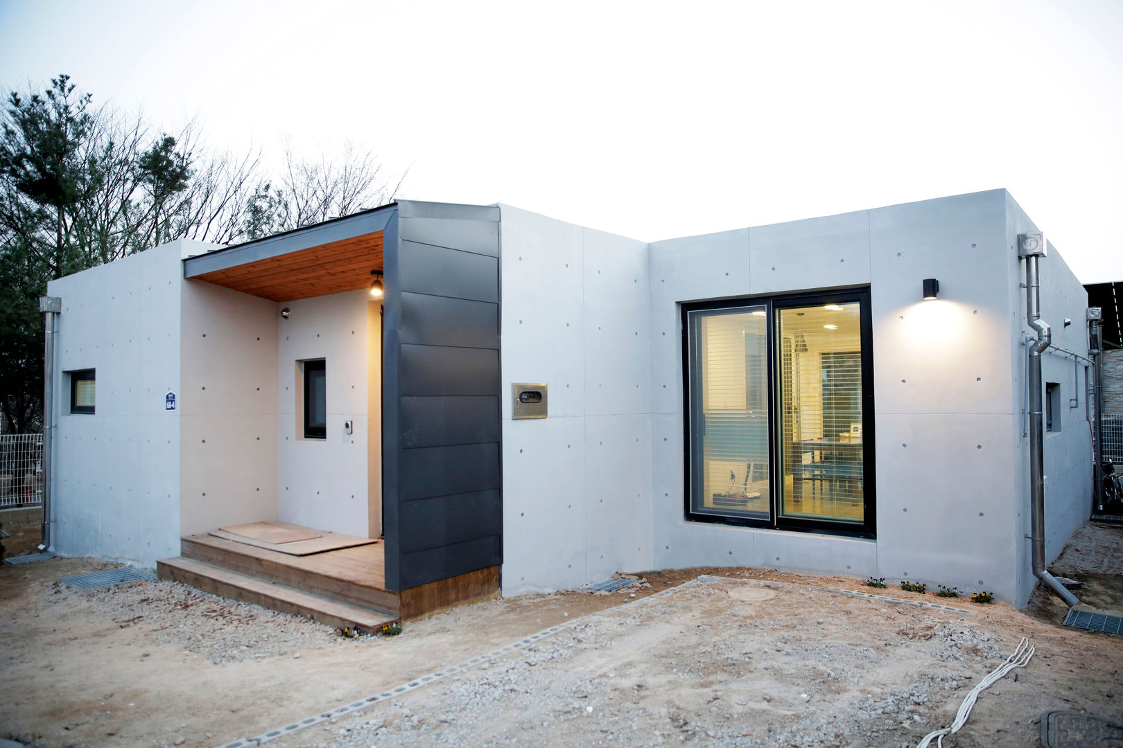 1억대로 짓는 중정을 품은 단층전원주택 , 한글주택(주) 한글주택(주) Casas estilo moderno: ideas, arquitectura e imágenes