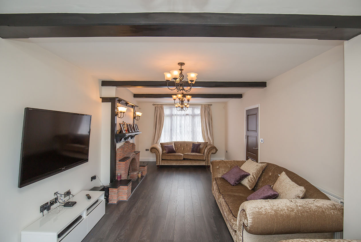 The main living space homify 모던스타일 거실 vintage,vintage furniture,feature,fireplace,wood beams