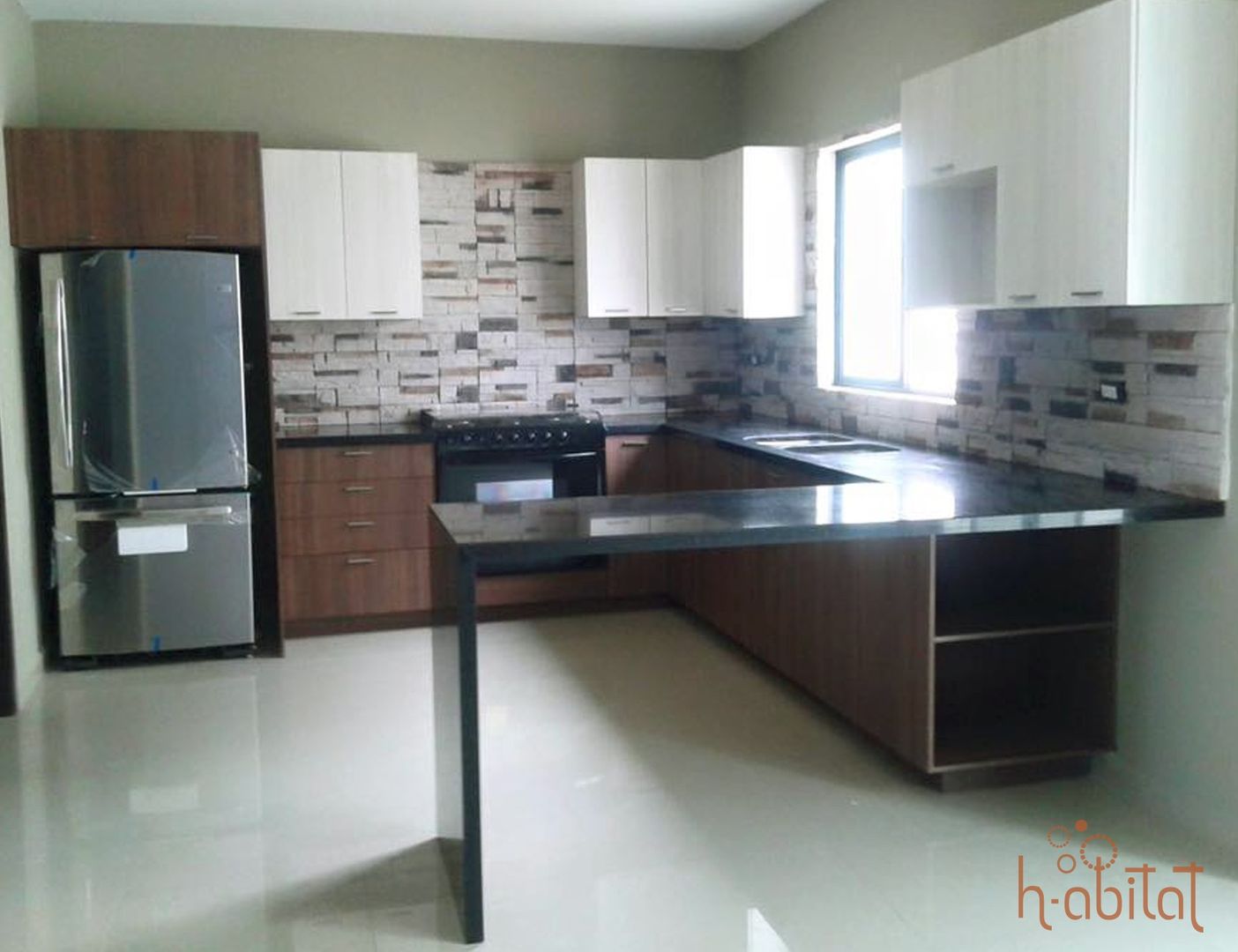 Cocina en Villas La Joya, H-abitat Diseño & Interiores H-abitat Diseño & Interiores ห้องครัว หิน