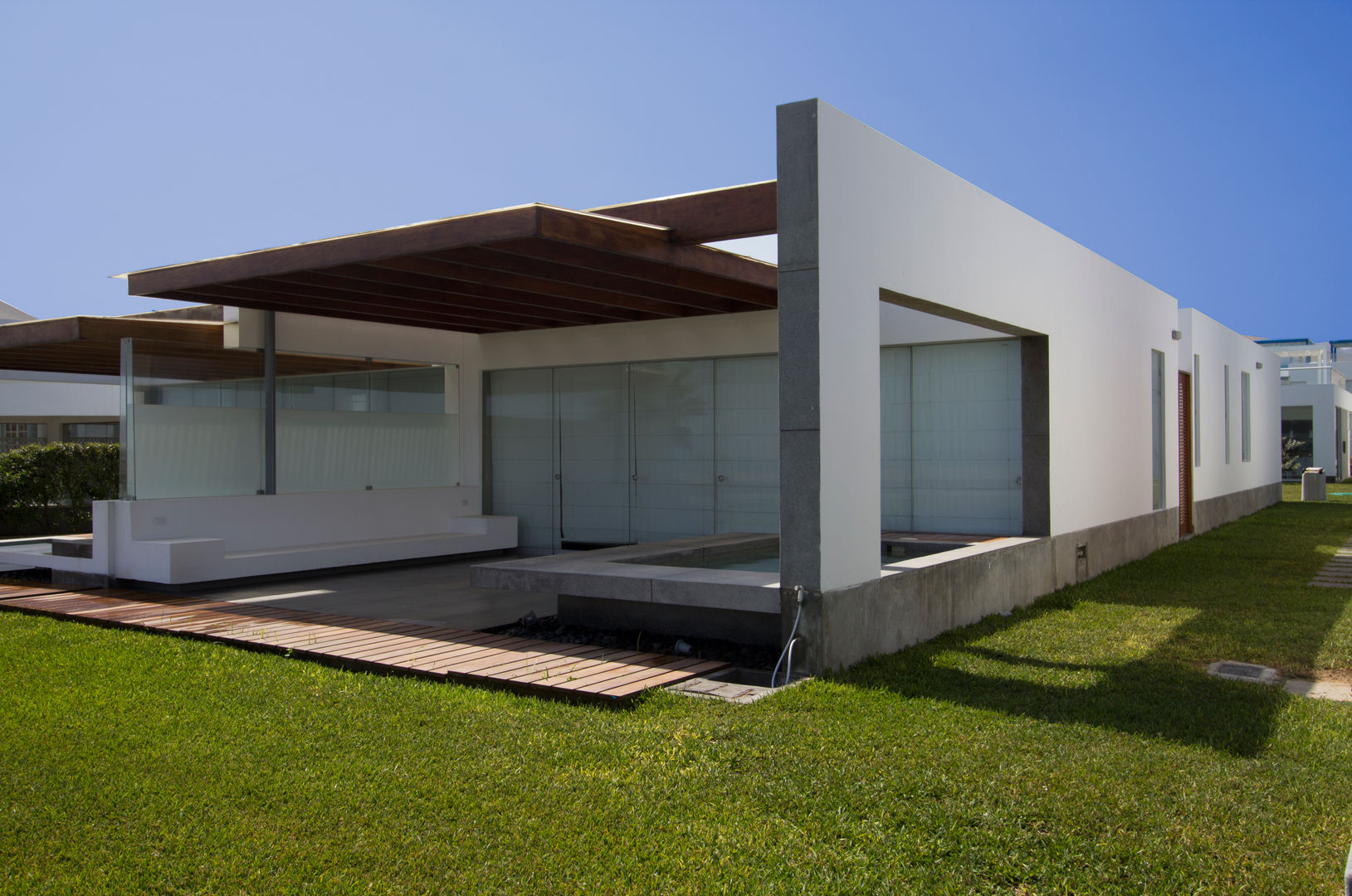 CASA DE PLAYA ARÉVALO, ARKILINEA ARKILINEA Minimalist houses