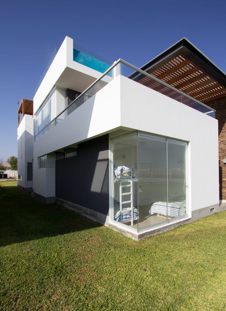 CASA DE PLAYA BARRÓN, ARKILINEA ARKILINEA Maisons minimalistes