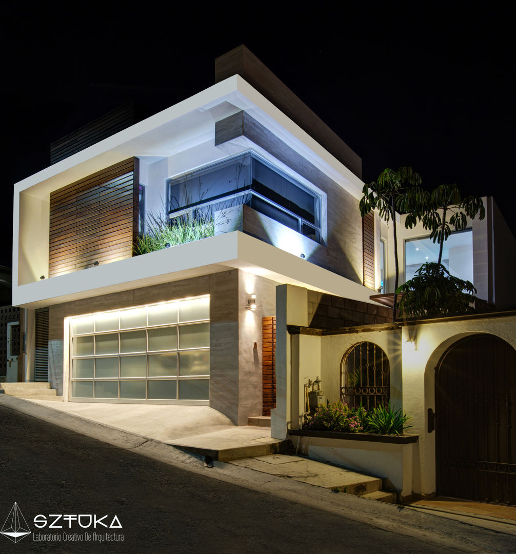 Fachada Principal de Noche SZTUKA Laboratorio Creativo de Arquitectura Casas modernas Madera Acabado en madera