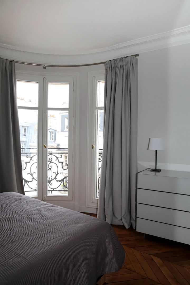 Agencement contemporain d’un appart Haussmannien, Agence Laurent Cayron Agence Laurent Cayron Chambre moderne