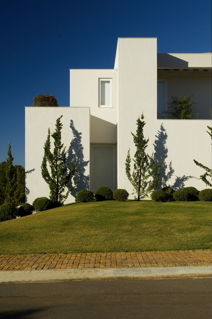 Casa no Morro do Chapéu, Lanza Arquitetos Lanza Arquitetos Casas modernas