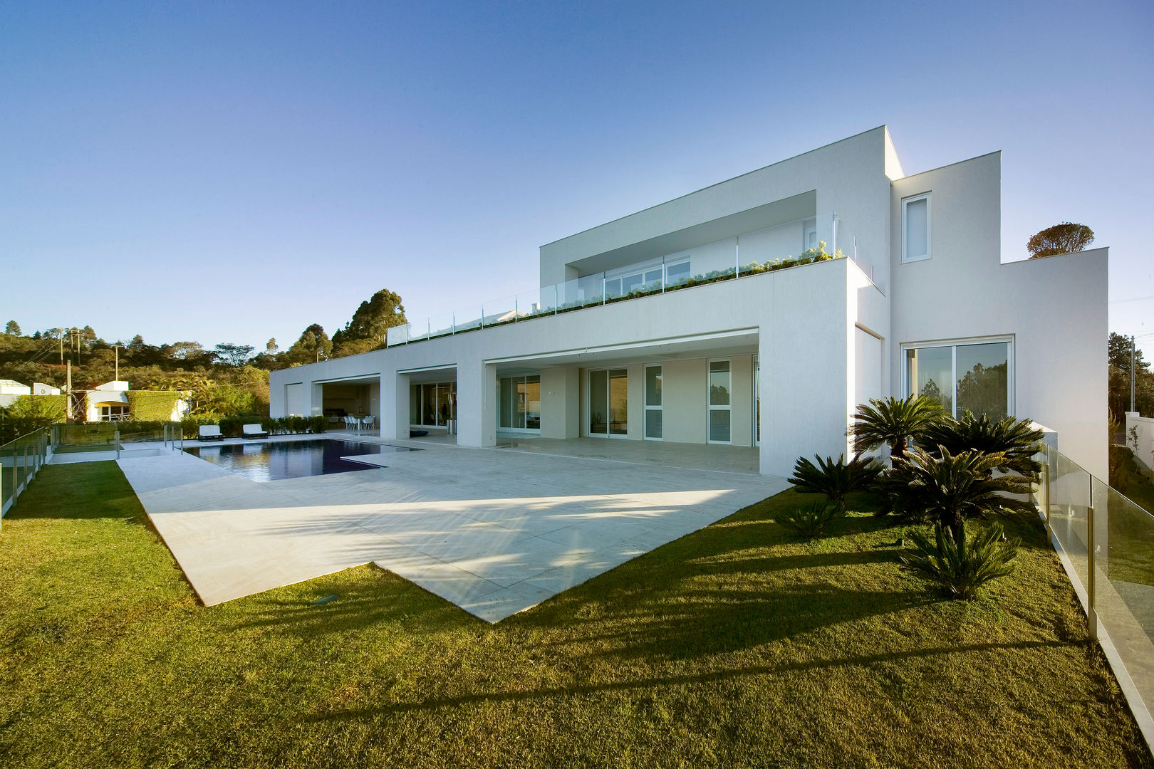 Casa no Morro do Chapéu, Lanza Arquitetos Lanza Arquitetos Casas modernas