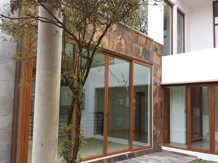 homify Puertas y ventanas modernas