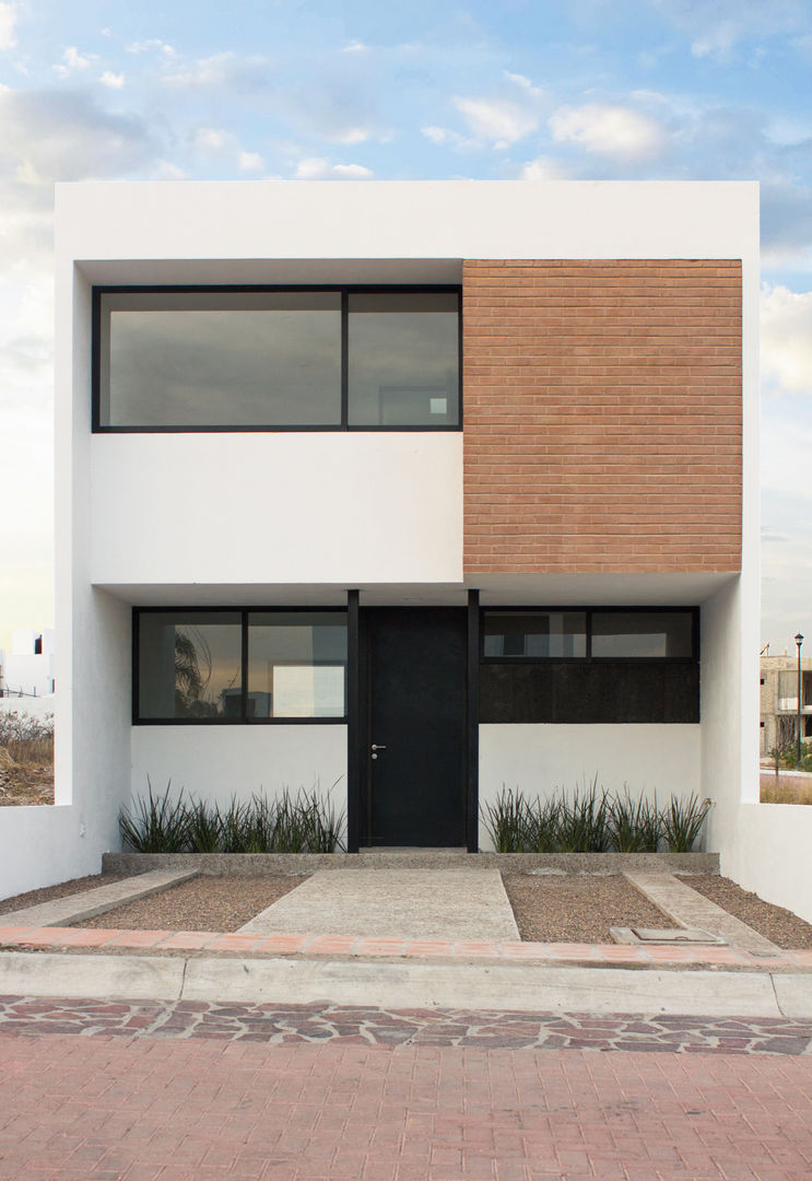 Casa Pedregal, Región 4 Arquitectura Región 4 Arquitectura Minimalistyczne domy Cegły