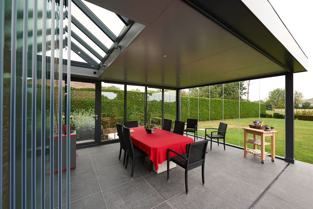 homify Modern conservatory Glass