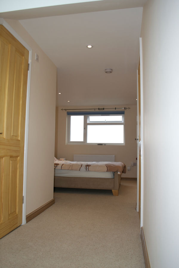 Let's take a peek inside this loft conversion... homify Classic style bedroom loft conversion,bedroom,attic bedroom,bed