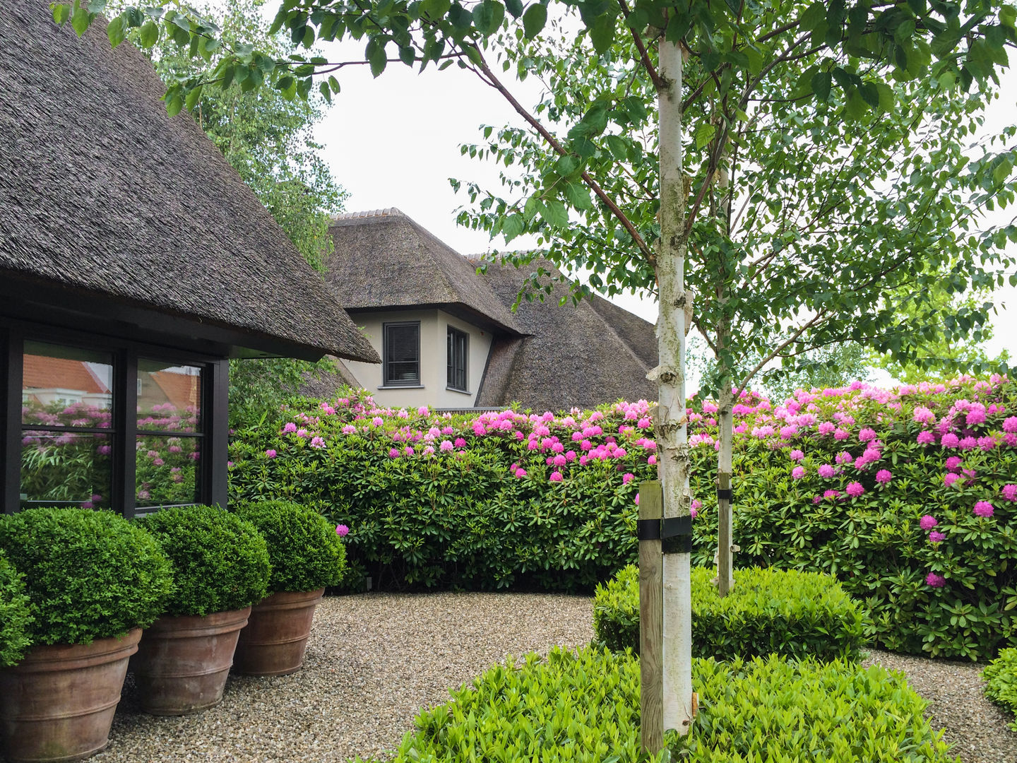 Tuin aan de plas, Vosselman Buiten Vosselman Buiten Jardins modernos