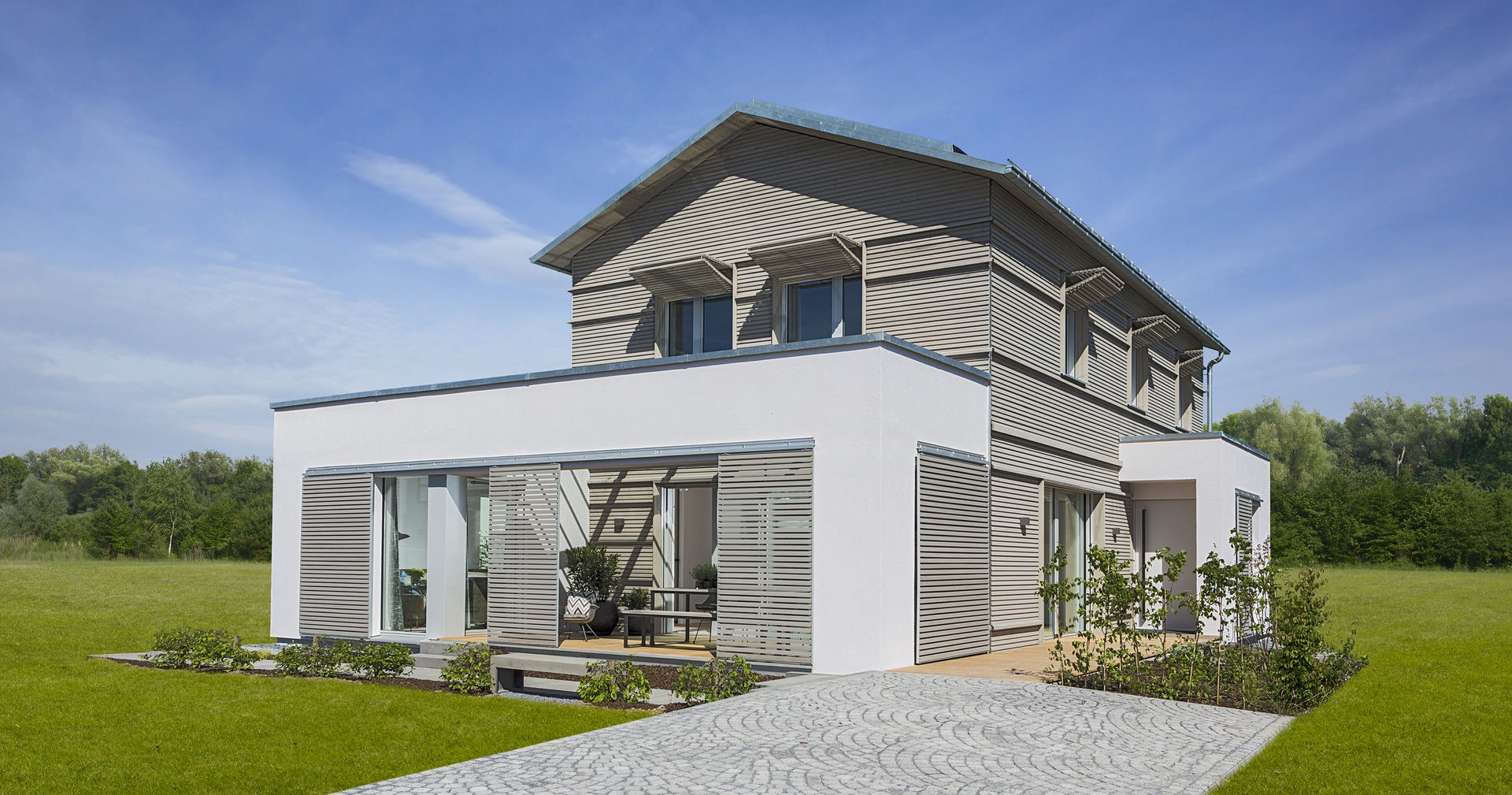 NaturDesign, Bau-Fritz GmbH & Co. KG Bau-Fritz GmbH & Co. KG Modern houses