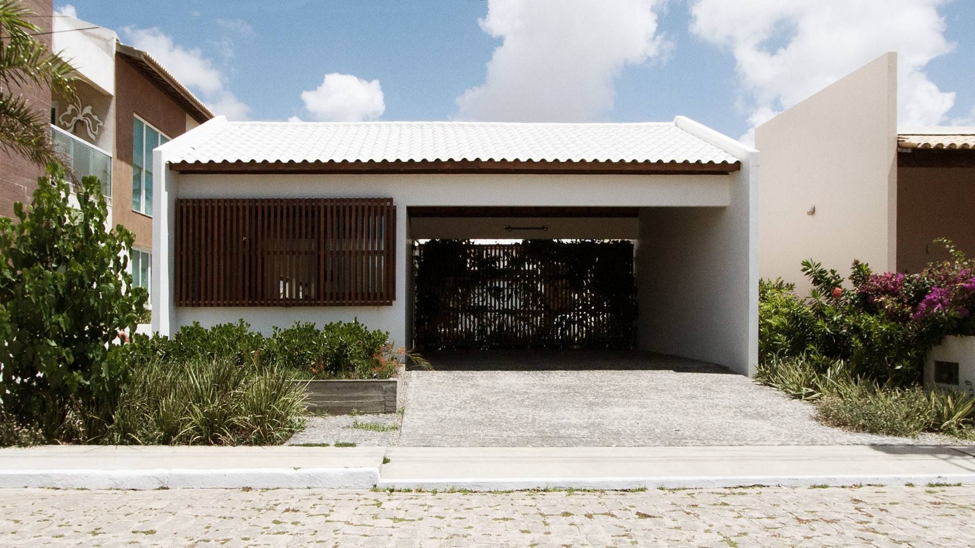 RESIDÊNCIA PÁTIO ARUANA, Coletivo de Arquitetos Coletivo de Arquitetos Minimalist houses