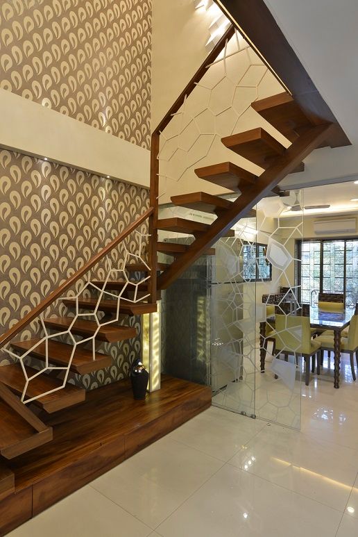 homify Modern corridor, hallway & stairs Wood Wood effect